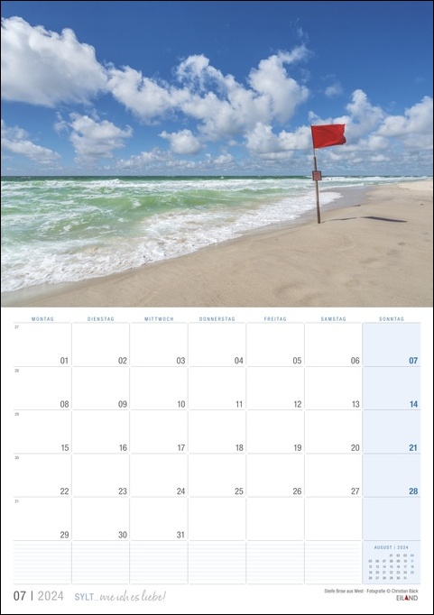 Ein Kalender mit roter Fahne am Strand von Sylt ... wie ich es liebe 2024.