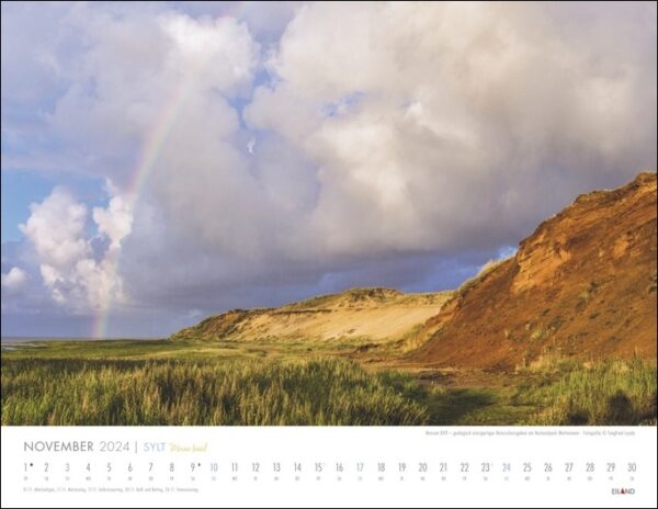 Ein Kalender „Sylt – Meine Insel“ 2024, der die malerische Insel Sylt mit einem leuchtenden Regenbogen am Himmel zeigt.