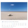 A Watt'n Meer - PostkartenKalender 2025 für Juni mit einer ruhigen Strandszene, mit einer großen Muschel auf Sand vor einem klaren blauen Himmel. Die Daten sind unten auf Deutsch ausgerichtet.